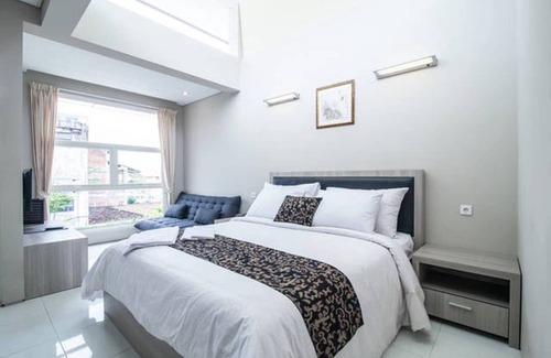 Pemecutan Kelod Apartment | Charming studio in Central Point B