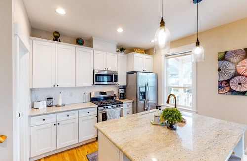 Olivia Beach House | Charming, three-story getaway w/two cozy living areas - walk to the beach