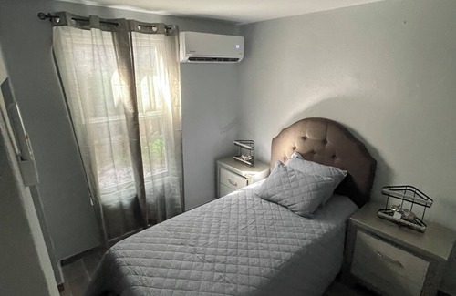 Barceloneta House | Charming Tiny little blue house 2-bedroom house in peaceful Barceloneta with AC