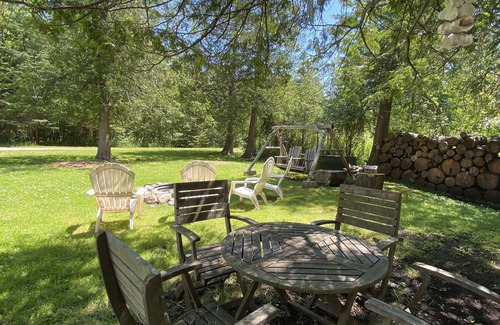 Alanson House | Charming Up North River Cottage