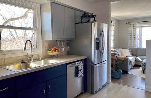 Council Bluffs House | Cheerful two bedroom home in quiet neighborhood. Sun Porch ~ Patio ~ Large yard