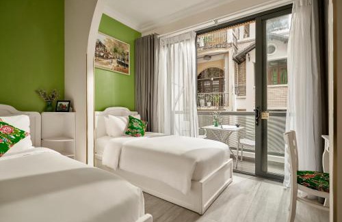 District 1 Hotel | Chez Mimosa Petite - Free Laundry