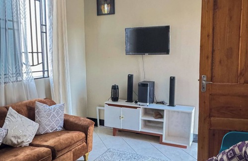 Dar es Salaam Apartment | Chic 1-bedroom apartment in amazing Dar es Salaam with WiFi, fitness room