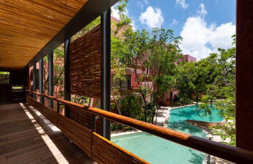 Zama Apartment | Chic Jungle 2 BR Condo by Happy Address