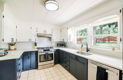Traverse City House | Chic Modern Home: Private Yard & Hot Tub!