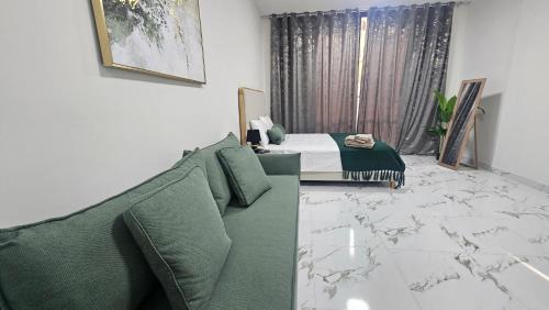 Al Hamra Village Apartment | Chic studio W10