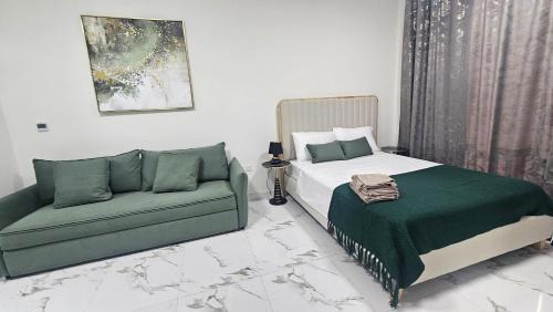 Al Hamra Village Apartment | Chic studio W10