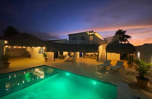 Tuscany Residence Aruba Apartment | Chic Studio with Private Terrace & Pool Access at Beach Walk 6 by Bocobay