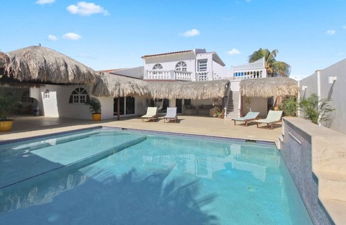 Tuscany Residence Aruba Apartment | Chic Studio with Private Terrace & Pool Access at Beach Walk 6 by Bocobay