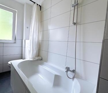 Frohnhausen Apartment | City Apartment with WIFI, Kitchen and 4K TV