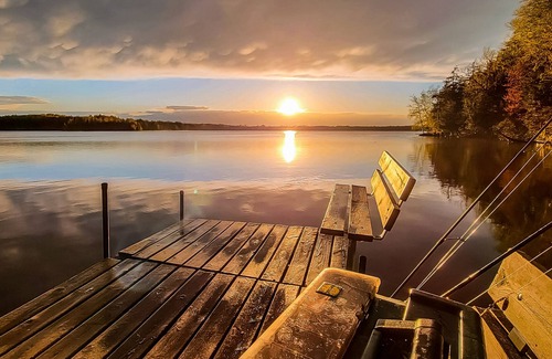 Presque Isle House | Classic, 5-suite, lakefront resort on South Turtle Lake with dock & firepit