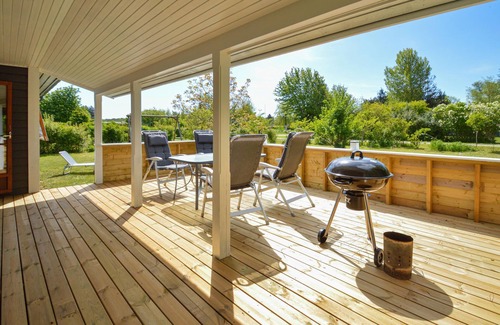 Næsby Strand House | Classic, Danish cottage near the water.