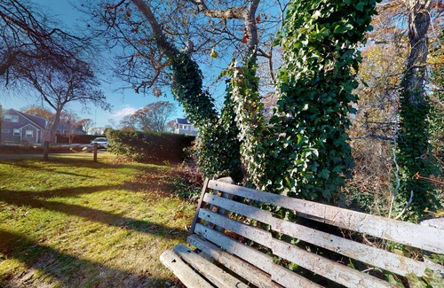 Teaticket House | Classic home with firepit & lovely yard, steps from Great Pond beach & path