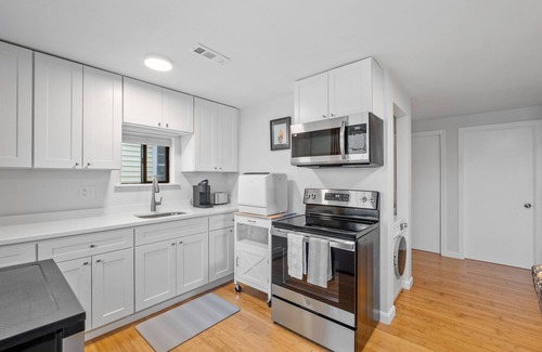 Hampton House | Clean, updated 2-bedroom home, 5 min walk to beach, pets ok, onsite parking!