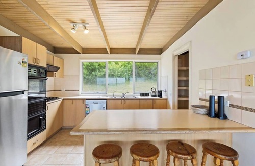 Powlett River House | Clifftop Cocoon Swing into Scenic Sea Views