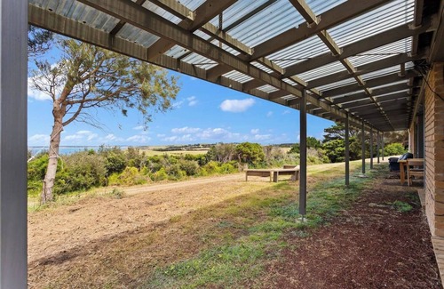 Powlett River House | Clifftop Cocoon Swing into Scenic Sea Views