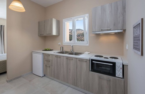 Kassiopi Apartment | Close to the beach, spacious one-bedroom apartment with sea views.