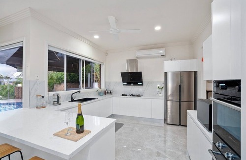 Benowa House | Coastal Family Waterfront Retreat + Pool