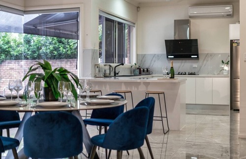 Benowa House | Coastal Family Waterfront Retreat + Pool