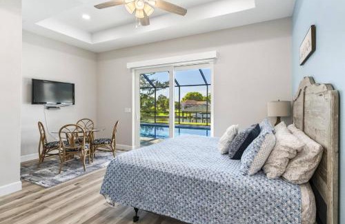 Palm Harbor House | Coastal Paradise Waterfront Pool Home