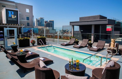 Little Italy Hotel | Colorful Artistic Suite with Balcony Views – Sustainable & Walkable | 4 Units