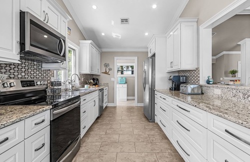 Caloosahatchee House | Combined Fun & Luxury at Epic Coastal Retreat - The Grand Riviera - Roelens