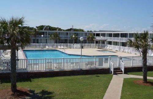 Atlantic Beach Apartment | Come for the beach, stay for the memories. Enjoy free beach access & huge pool!