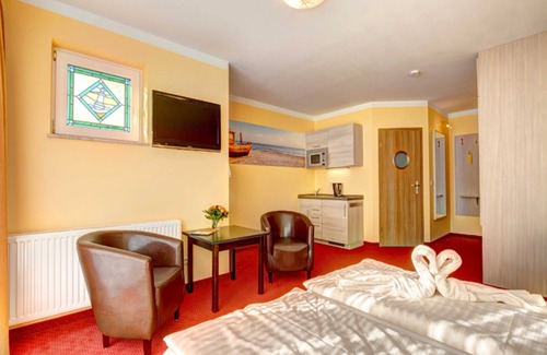 Ahlbeck House | Comfort room with pantry kitchen special - Aparthotel Strandhus Trivago Award