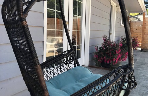 Silverdale House | Comfortable family retreat with fireplace, views and game room.