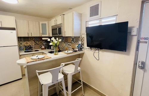 Bucana Apartment | Compact Haven with Private Entrance and FREE Parking and Laundry