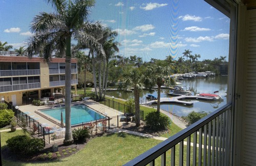 Royal Harbor Condo | Condo with Boat Dock, 1.5 miles to beach, and 2 blocks to 5th Avenue!