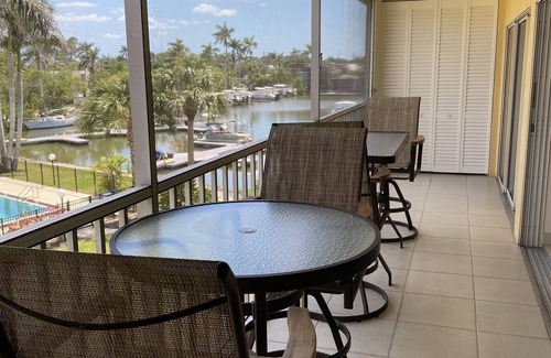 Royal Harbor Condo | Condo with Boat Dock, 1.5 miles to beach, and 2 blocks to 5th Avenue!