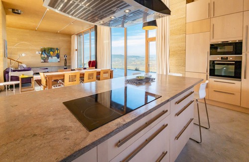 Villars House | Contemporary 4-bed house with infinity pool and countryside views.