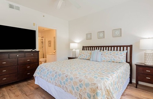 Ole Condo | Coral Falls - 1st floor condo - private screened lanai w/views of indoor 65" TV & steps to pool/spa