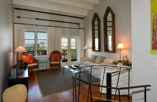 Seaside House | Cork the Whine- Seaside, FL Balcony with town views, Stylish luxury