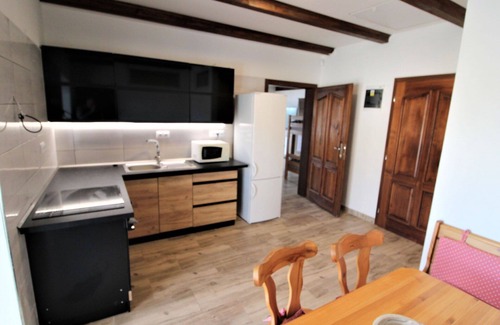 Zupanovice Apartment | Cosy apartment for 9 people with pool, WIFI, TV, patio and pets allowed