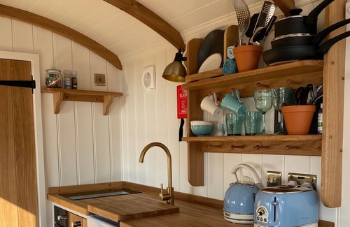 Les Vinaires Cabin | Cosy Shepherd Hut with wood burner and radiator - panoramic sea views!