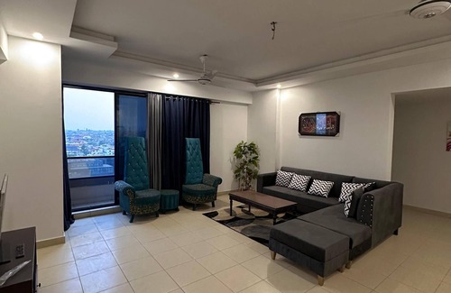 Rawalpindi Apartment | Cosy Sky-High Retreat: Ultimate Cityscape from the Top Floor