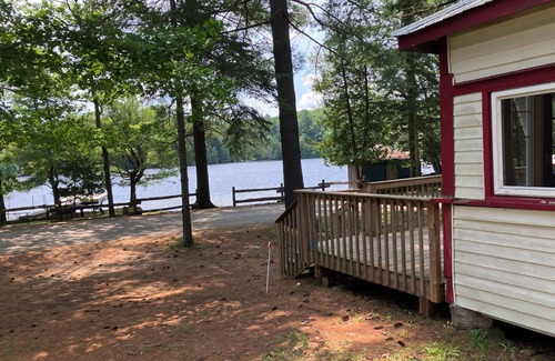 Minden House | Cottage on Horseshoe Lake, Minden, level lot, south facing, sandy beach