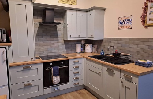 Waren Mill House | Cove Cottage - charming quiet barn conversion near the sea Budle Bay, Waren Mill