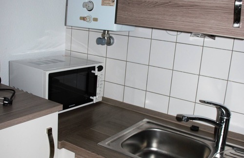 Suedviertel Apartment | Cozy 2-room apartment between main station and Aalto-Theater with small balcony. Balcony i