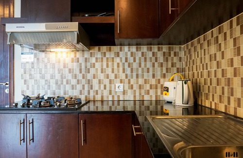 Karet Apartment | Cozy 2BR at Empyreal Epicentrum Apartment By Travelio