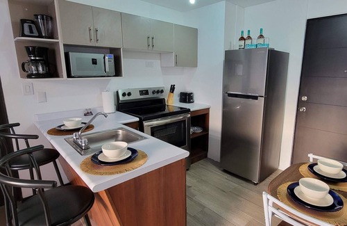 Zona 12 Apartment | Cozy apartment, your family will be close to everything. City & volcanoes views.