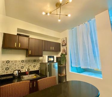 Pinagsama Apartment | Cozy Cabin by JLS Near Venice Grand Canal Mall