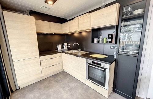 Jullouville Ski Chalet | Cozy Chalet for 6 with Heated Pool, Terrace, and Parking near Beach