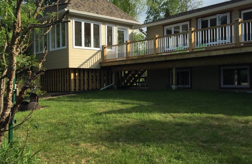 Cayamant Ski Chalet | Cozy cottage on a beautiful shallow sand beach at Patterson lake!