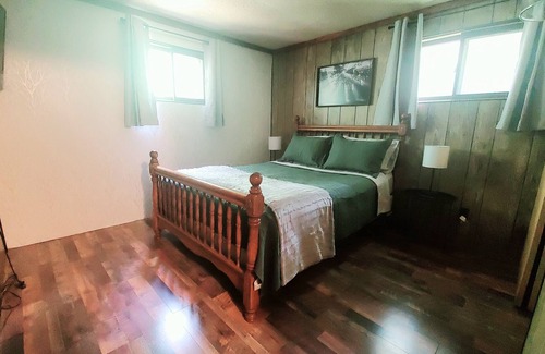 Millersburg Cottage | Cozy Cottage on the Pond Woodsy Retreat Dogs allowed Ocqueoc Falls