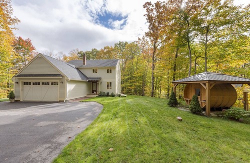 Meredith House | Cozy family friendly home in the lakes region with outdoor cedar sauna