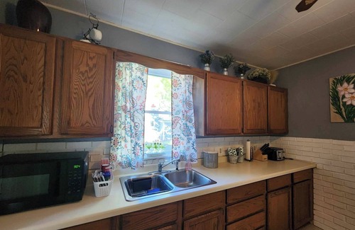 Marquette House | Cozy family friendly home nestled in the bluffs just steps from the Mississippi!