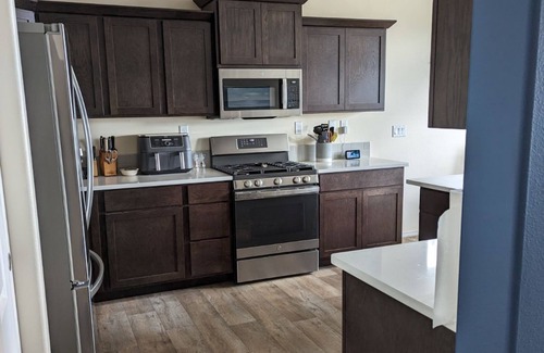 Rathdrum House | Cozy house with fenced in back yard. Pet-Friendly!
